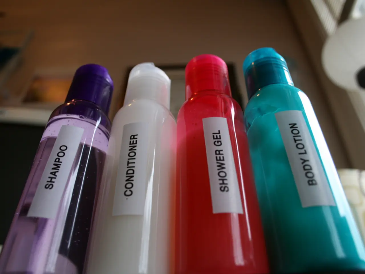 This image consist of four bottles. They are shampoo, conditioner, shower gel, and body lotion. All...