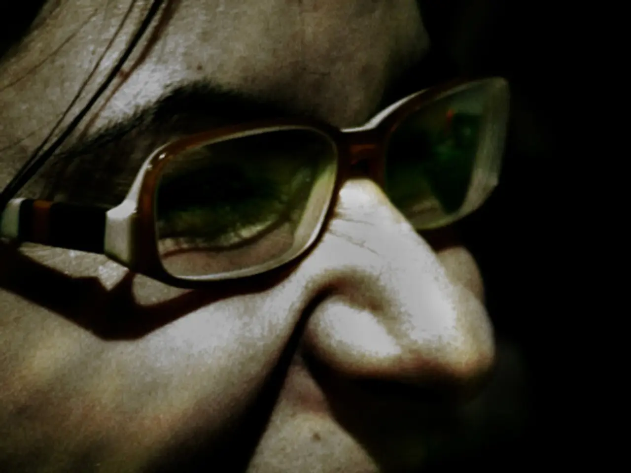 In this image we can see a person smiling.