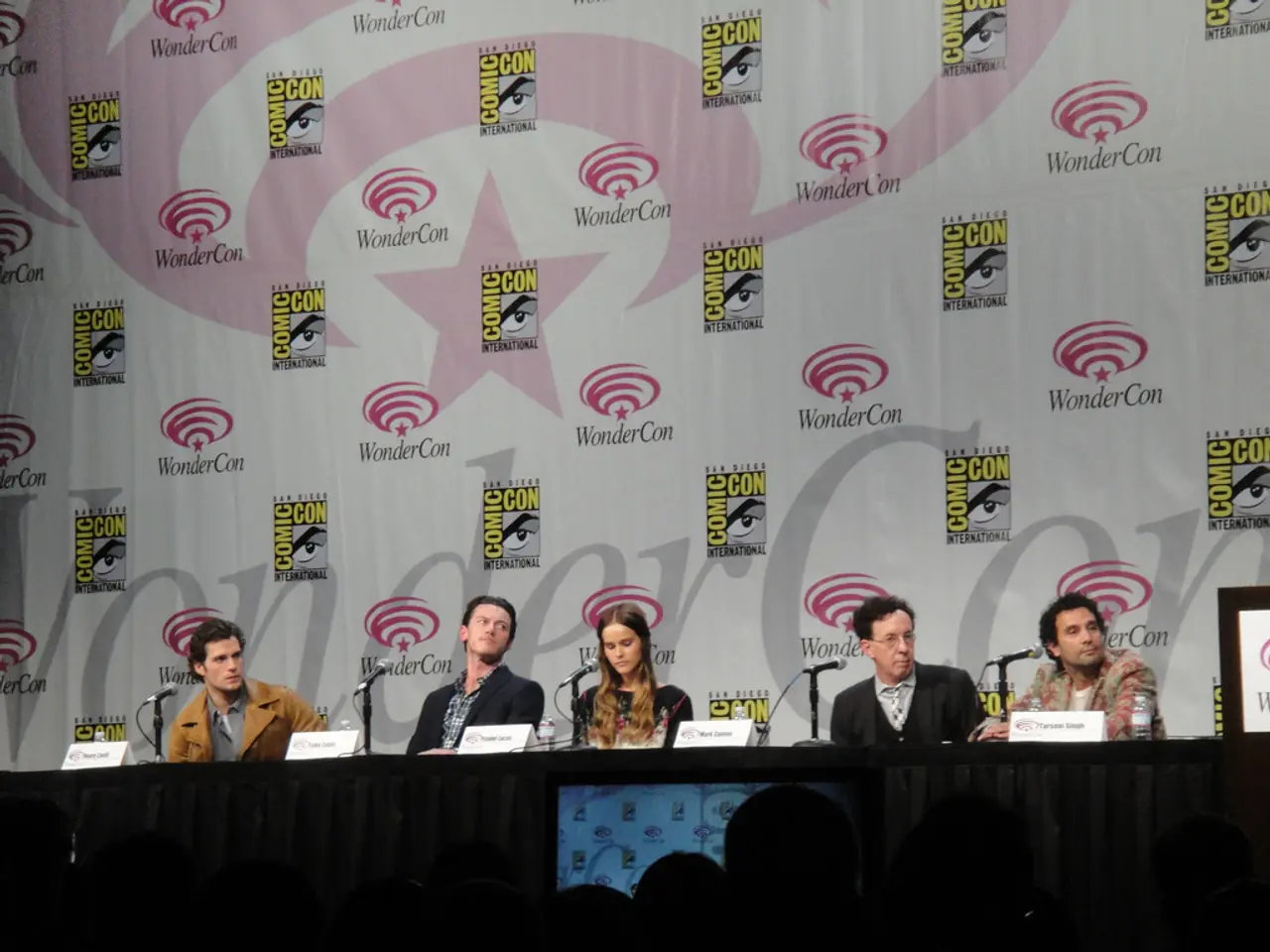 There are people sitting in the foreground area of the image, there are mice and place cards on the...