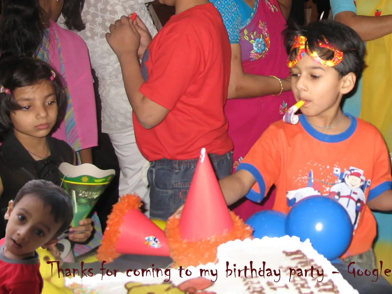 This is the picture of a place where we have some kids in front of the table on which there is a...