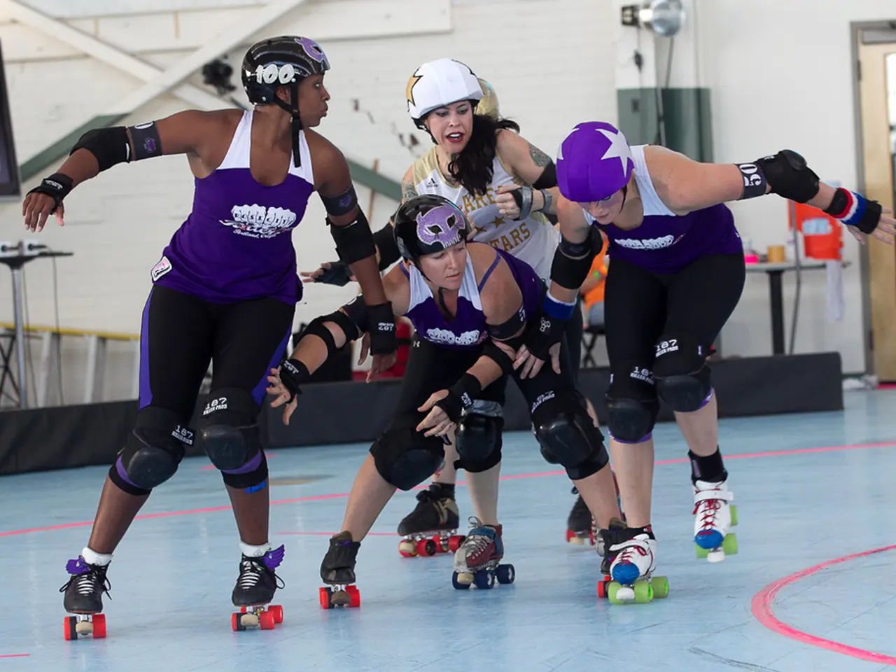 In the image in the center, we can see four people are skating and wearing helmets. In the...