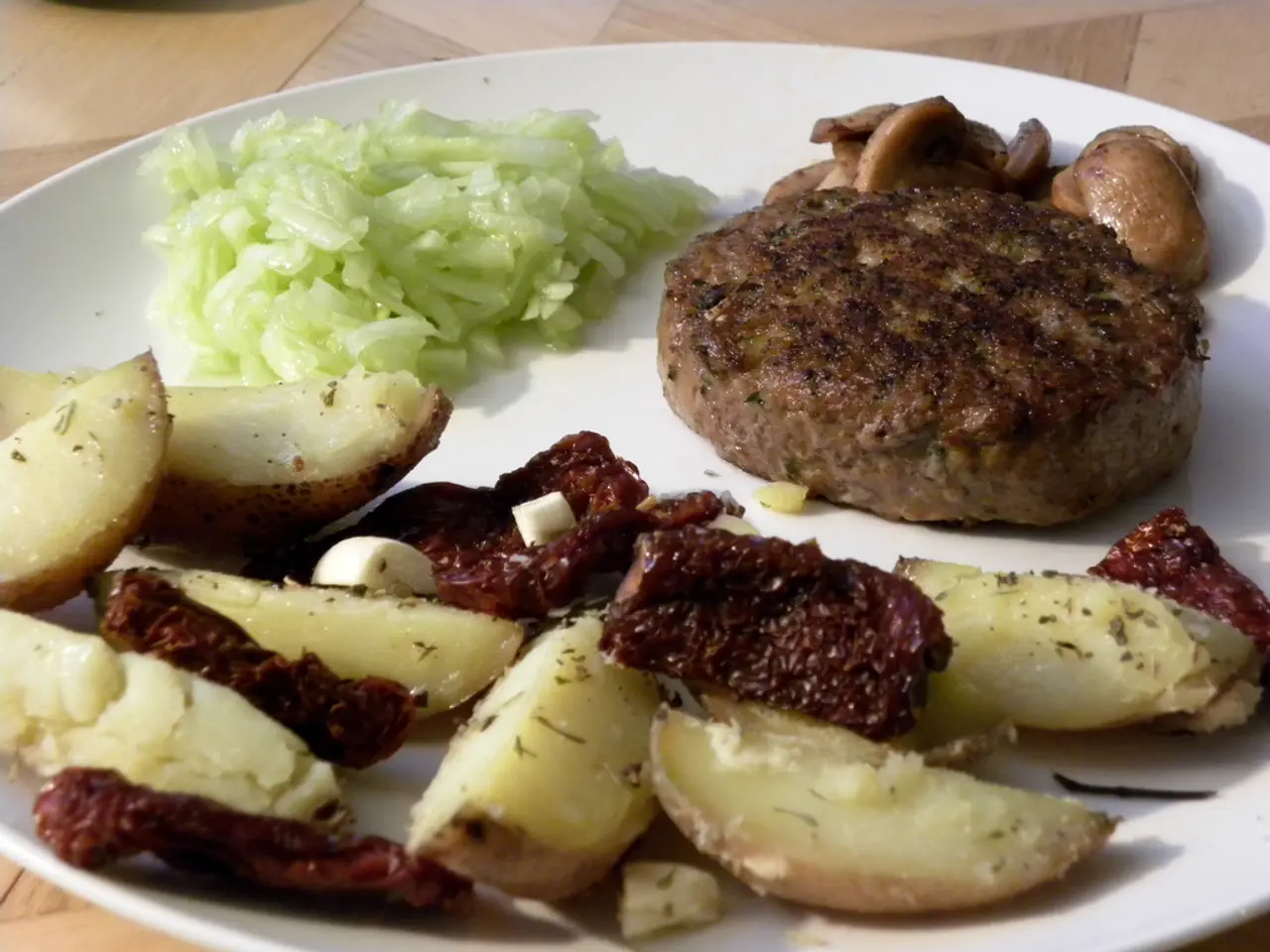 In this image I can see there is a table. On the table there is a plate and there is a sweet potato...