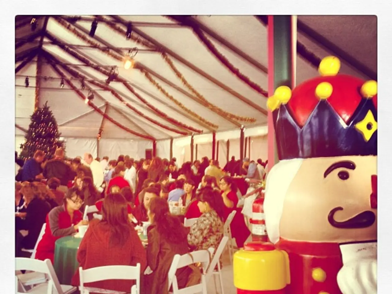 This is a picture in a shed, there is a group of people who are celebrating the Christmas this is a...