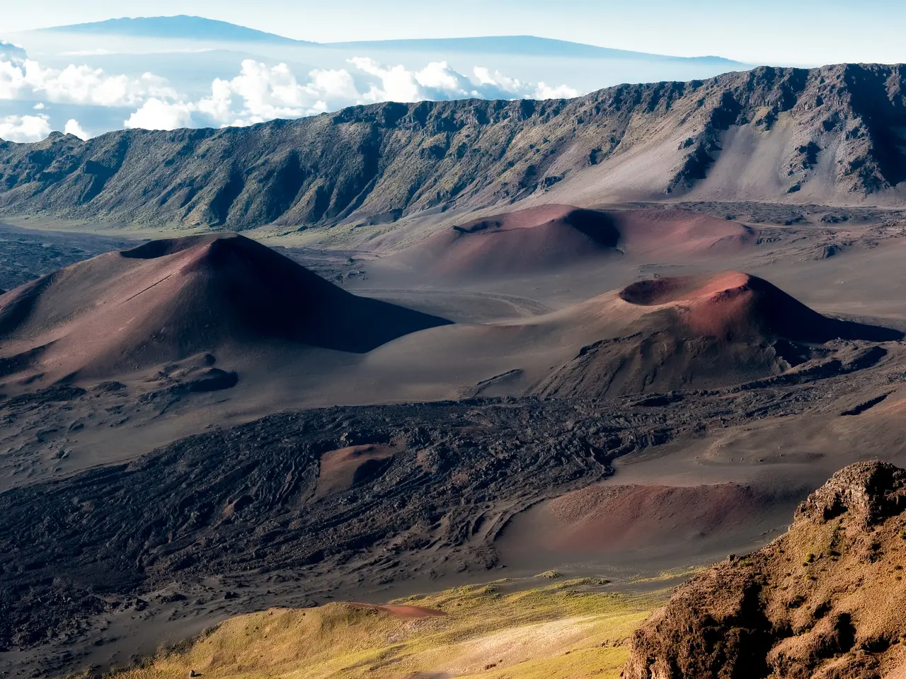 The image shows a stunning view of the Haleakala National Park in Maui, Hawaii, with its majestic...