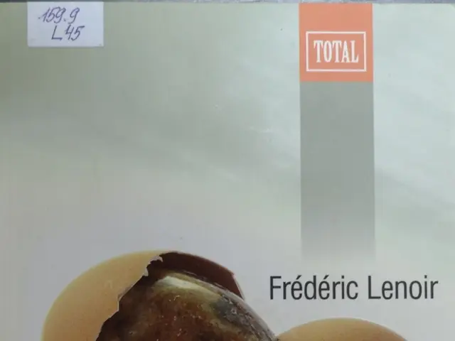 In this image, we can see a broken egg and some text.