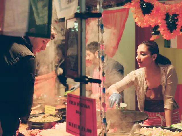 In this image I can see three persons and I can see two of them are wearing gloves. On the bottom...