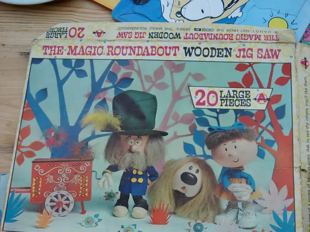 In this image, this looks like a puzzle and a cardboard box with the cartoon pictures on it. At the...