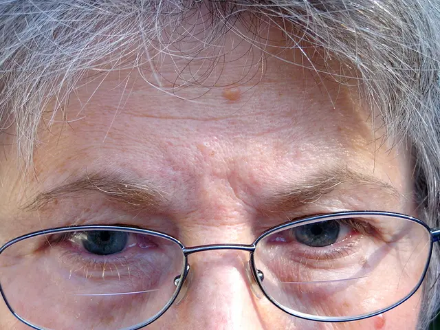 It is a zoomed in picture of a person wearing the glasses.