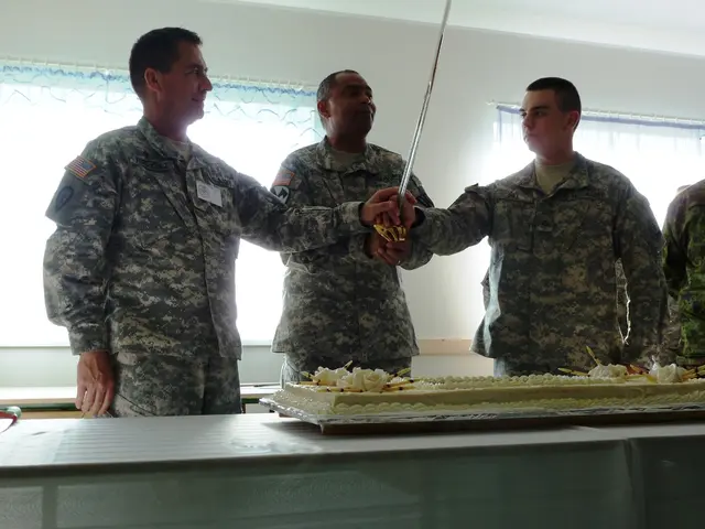 In the picture there is a large cake placed on a table and in front of the table there are few...