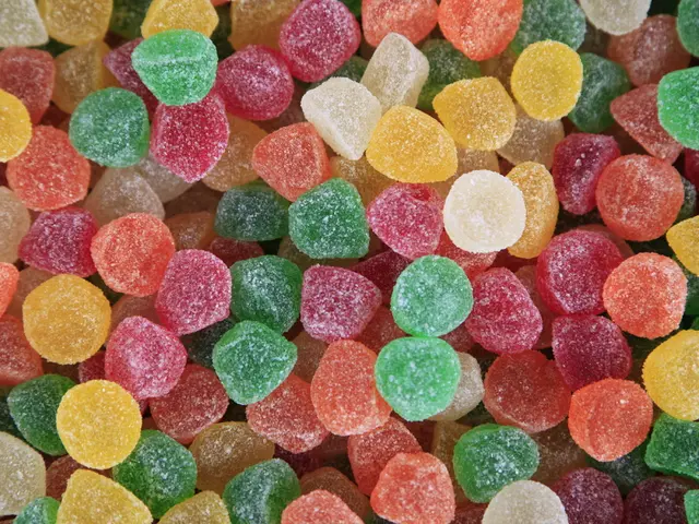 Sugar candies of different colors are in a place.