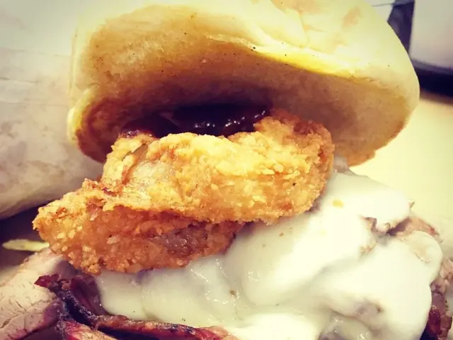 In this image I can see food contains breads and cream.