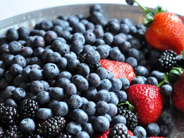 This image consists of blackberries, blueberries and strawberries.