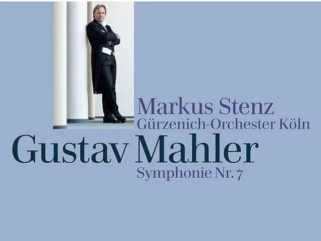 It is the cover page of some magazine there is a person picture and behind that there is a purple...