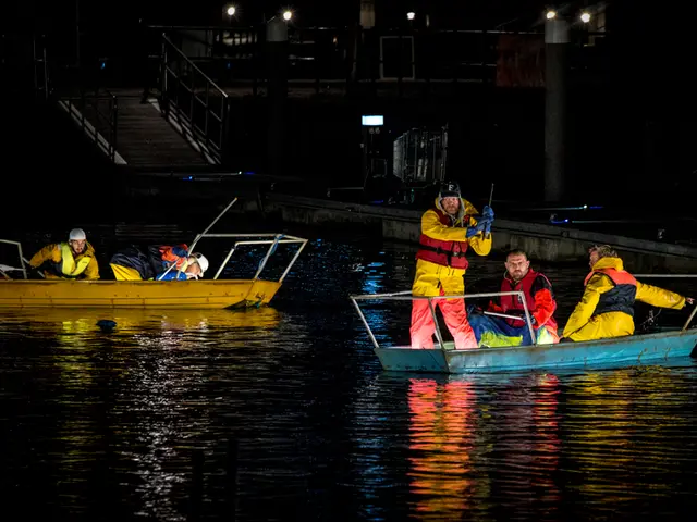 In this picture we can see few people in the boats, and we can find few metal rods, lights and...