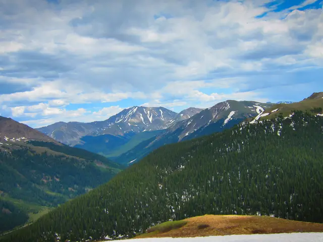 In the center of the image there are mountains.