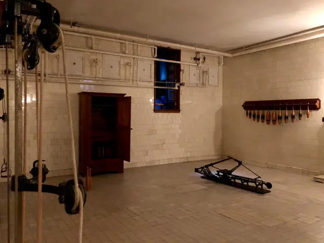 The image shows a room filled with lots of different types of equipment, including ropes, machines,...