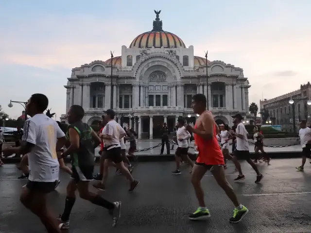The image shows a group of people running in front of a large building, with street poles, street...