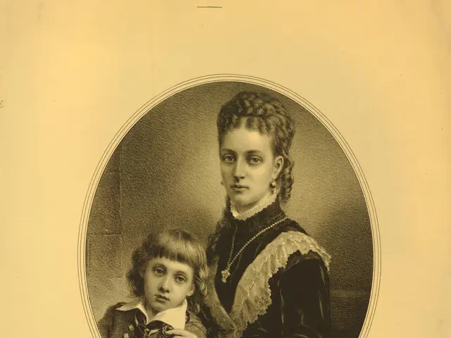 The image shows a black and white photo of a woman holding a child. The woman has a gentle...