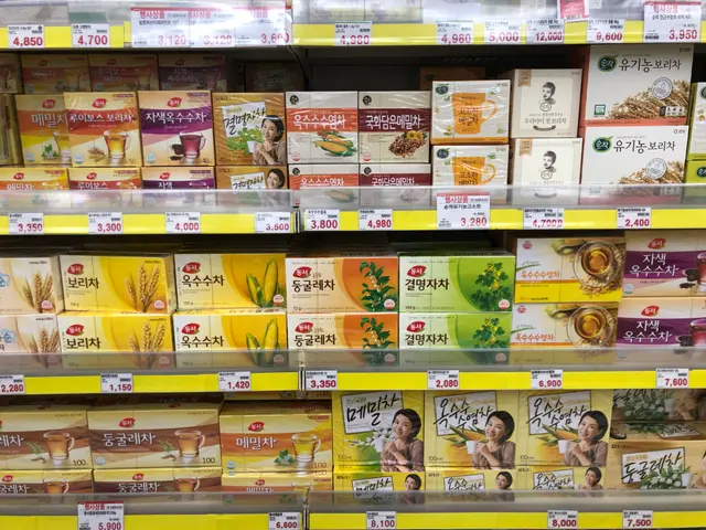 The image shows a store shelf filled with lots of different types of food, including boxes with...