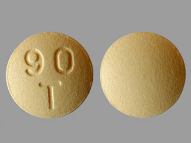 The image shows a yellow pill with the number 90 on it against a white background.
