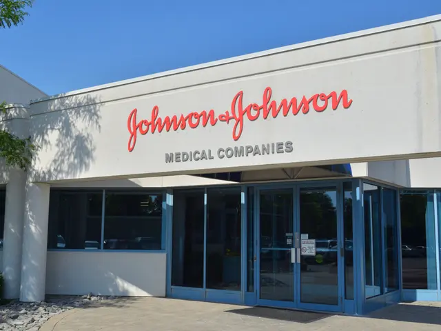 The image shows the Johnson & Johnson Medical Companies building with glass walls and doors, text...
