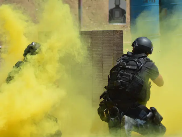 The image shows two police officers in riot gear with yellow smoke coming out of their mouths,...