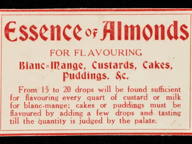 The image shows a red and white label with the words "Essence of Almonds for Flavouring" written on...