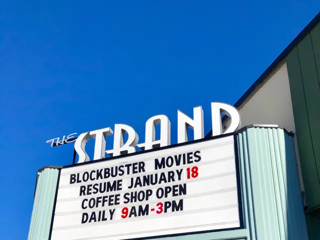 The image shows the Strand Blockbuster Movies Resume January 18 Coffee Shop, with a name board on...
