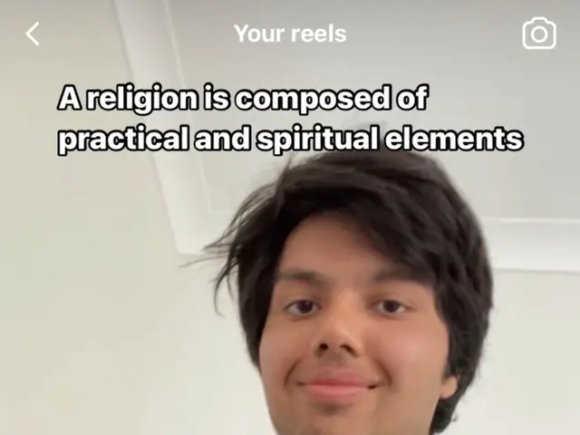 The image shows a man holding up a book with the words "A Religion is composed of practical and...