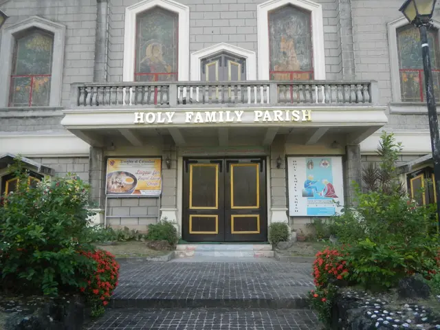The image shows the Holy Family Parish in Manila, Philippines. It is a building with windows,...