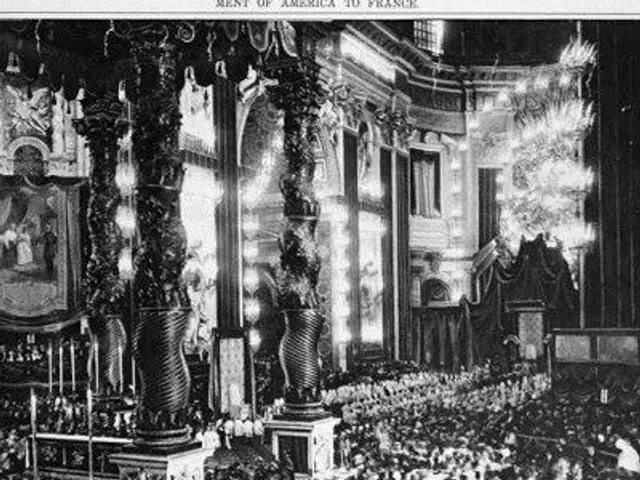 The image shows a black and white photo of a large crowd of people in a church, with pillars,...