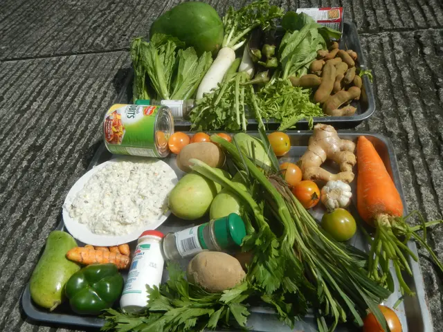 The image shows a tray filled with a variety of vegetables, including tomatoes, capsicum, carrots,...