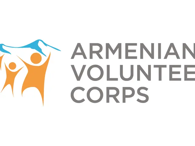 The image shows the Armenian Volunteer Corps logo, which consists of a blue circle with a white...