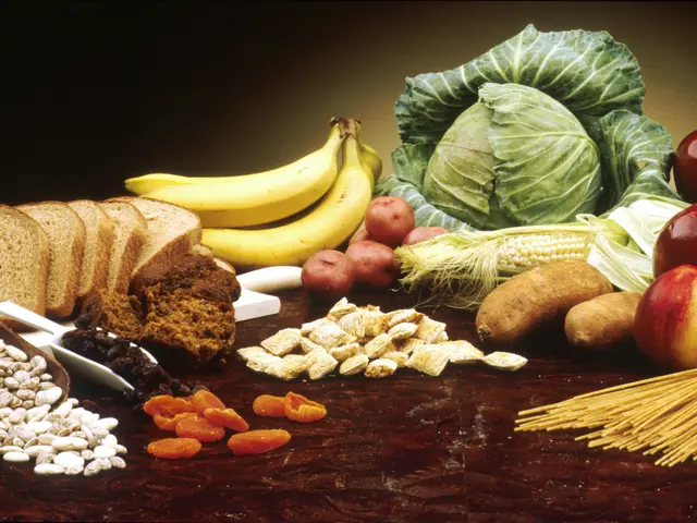 The image shows a table topped with a variety of fruits and vegetables, including apples, bananas,...