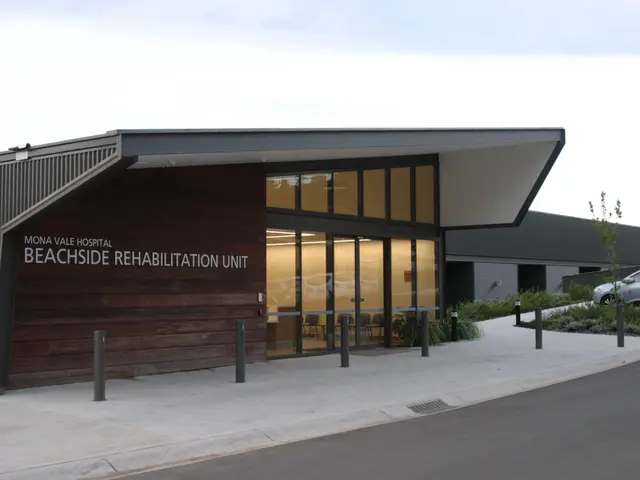 The image shows the Mona Vale Hospital Beachside Rehabilitation Unit, with a car parked in front of...