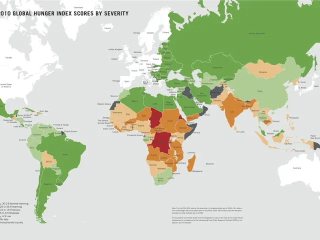 The image shows a map of the world with different colors representing the global hunger index...